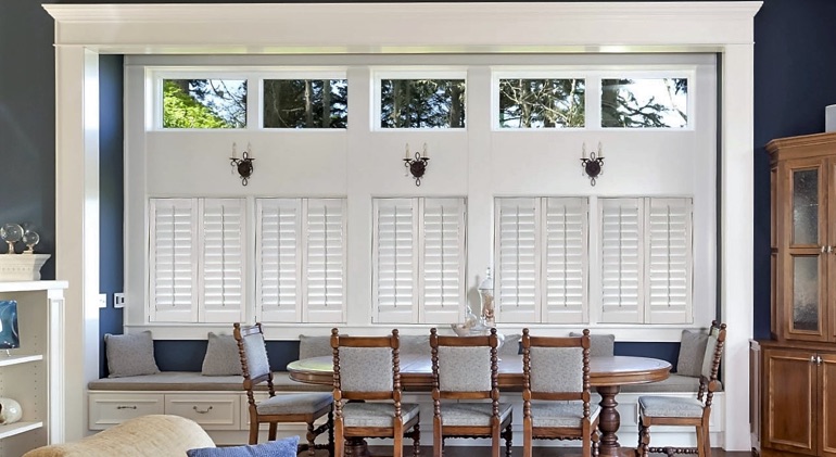 Chicago dining room with shut plantation shutters.